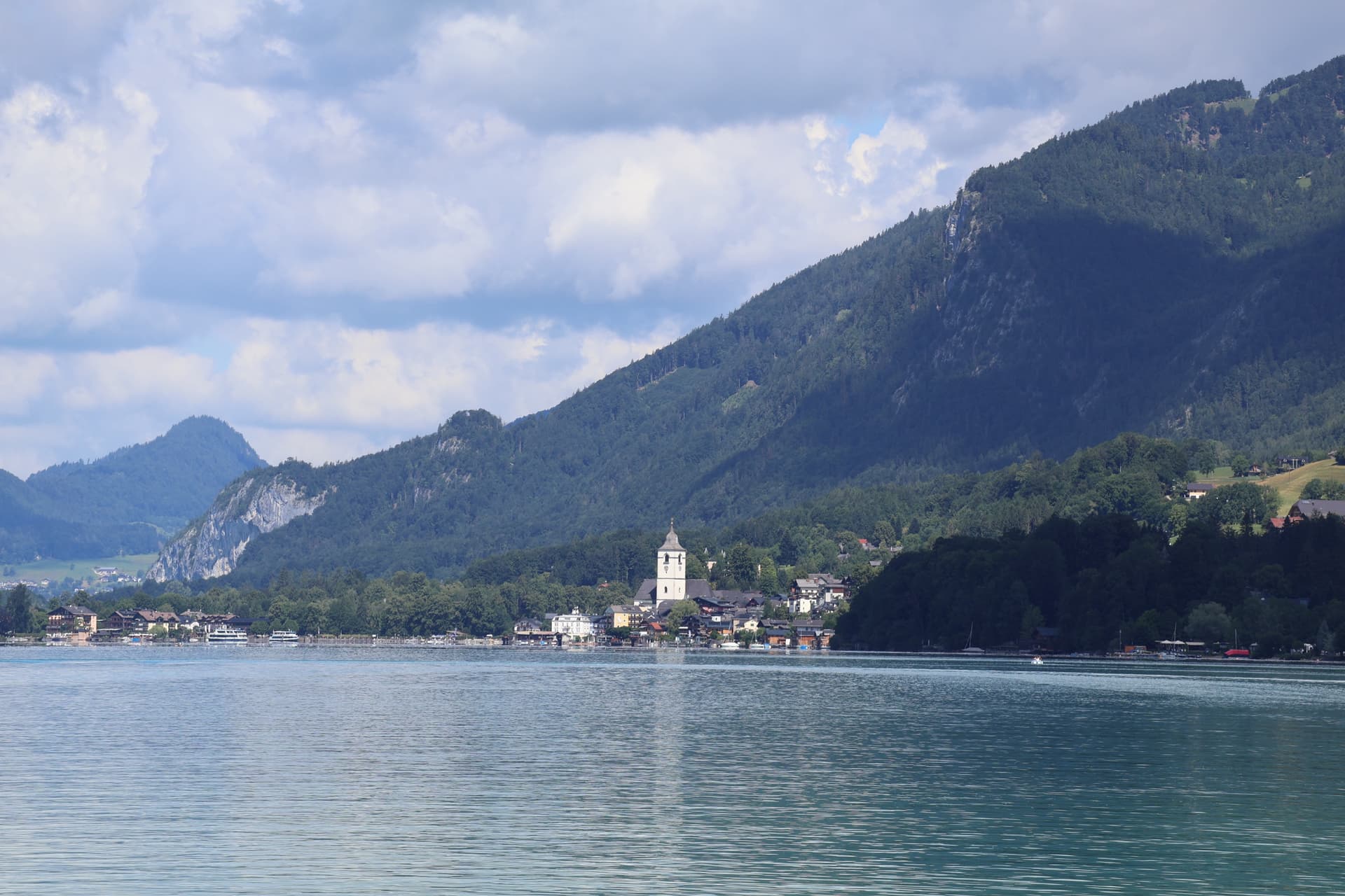 Wolfgangsee lake and St. Wolfgang village with mountains in Austria